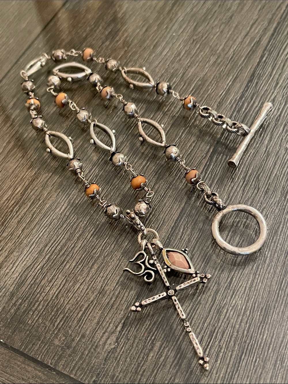 Lucky Brand Wooden Bead Rosary Style Toggle Necklace with Cross & Om Charm
